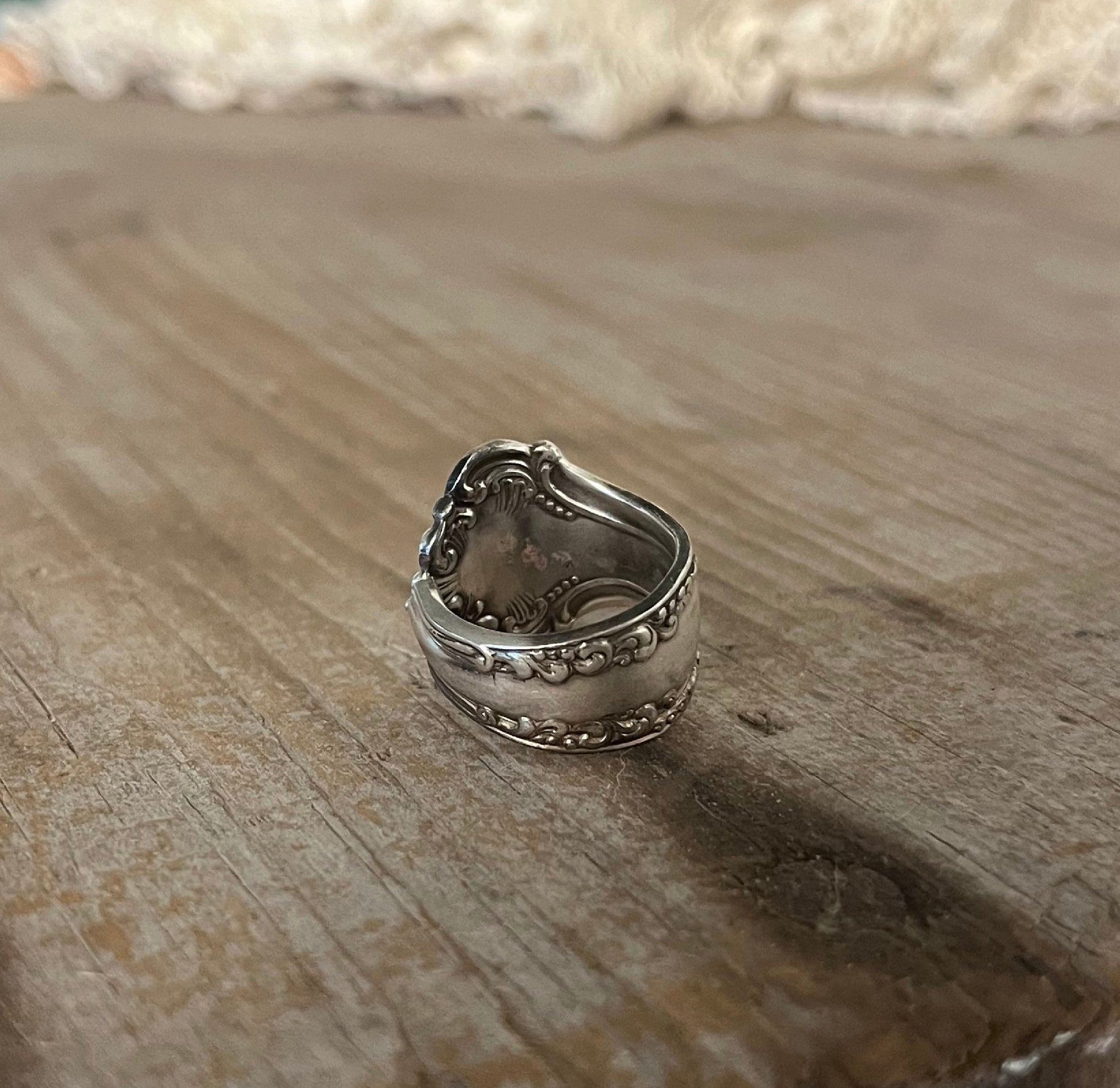 Detail of AVON pattern spoon ring highlighting unique upcycled silverware design