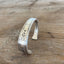 BADASS hand-stamped spoon cuff bracelet front view showing Tudor Plate Medality pattern - handcrafted from upcycled vintage silverware