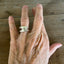 Fork tine double band ring with hand-stamped heart on model finger - fork ring - handcrafted from upcycled vintage silverware - Laughing Frog Studio