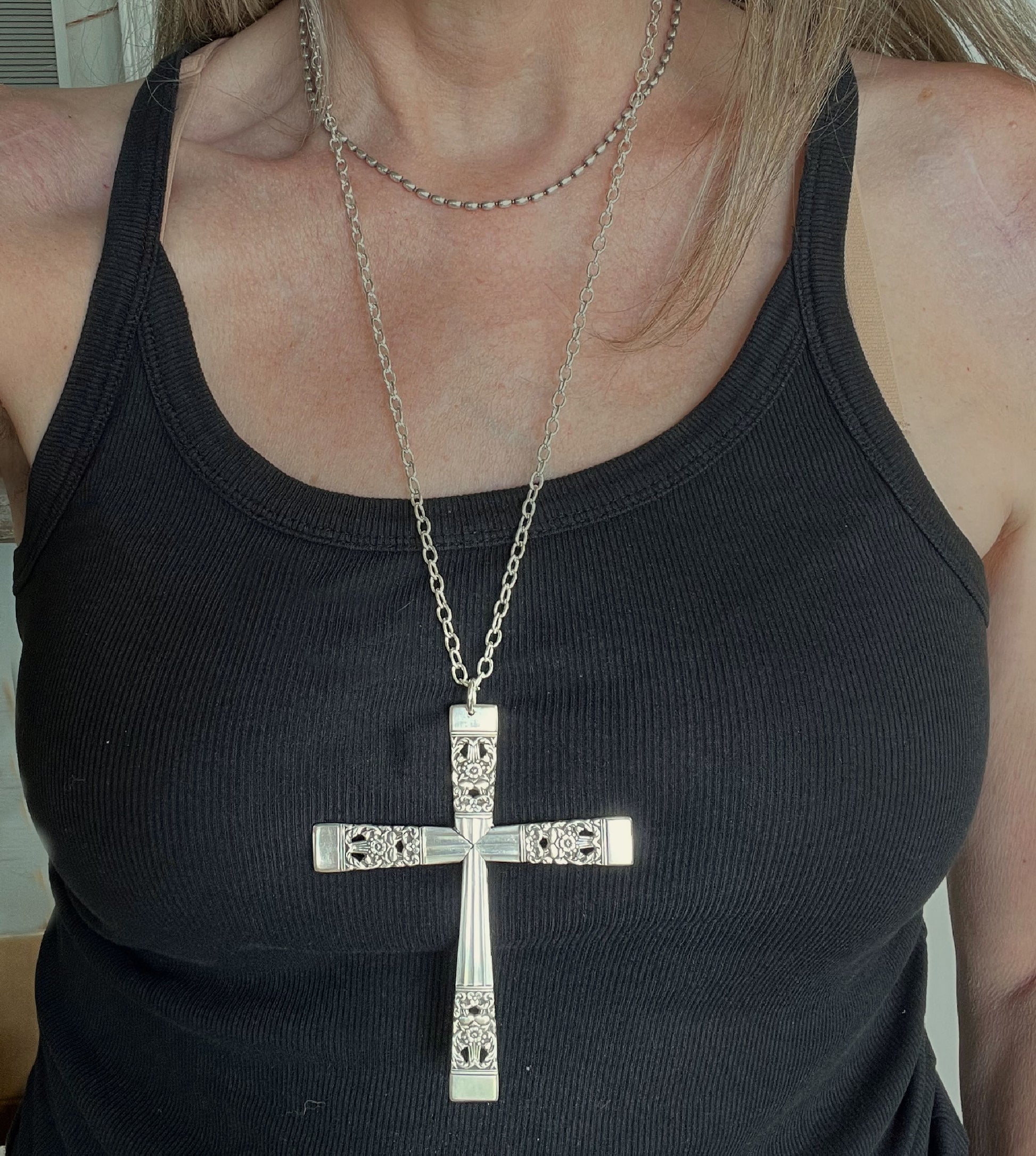 Coronation spoon cross necklace shown on model - handcrafted upcycled vintage silverware jewelry