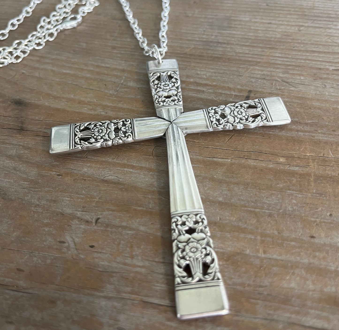 Side view of boho Coronation spoon cross pendant showing vintage silverplate pattern and handcrafted detail"