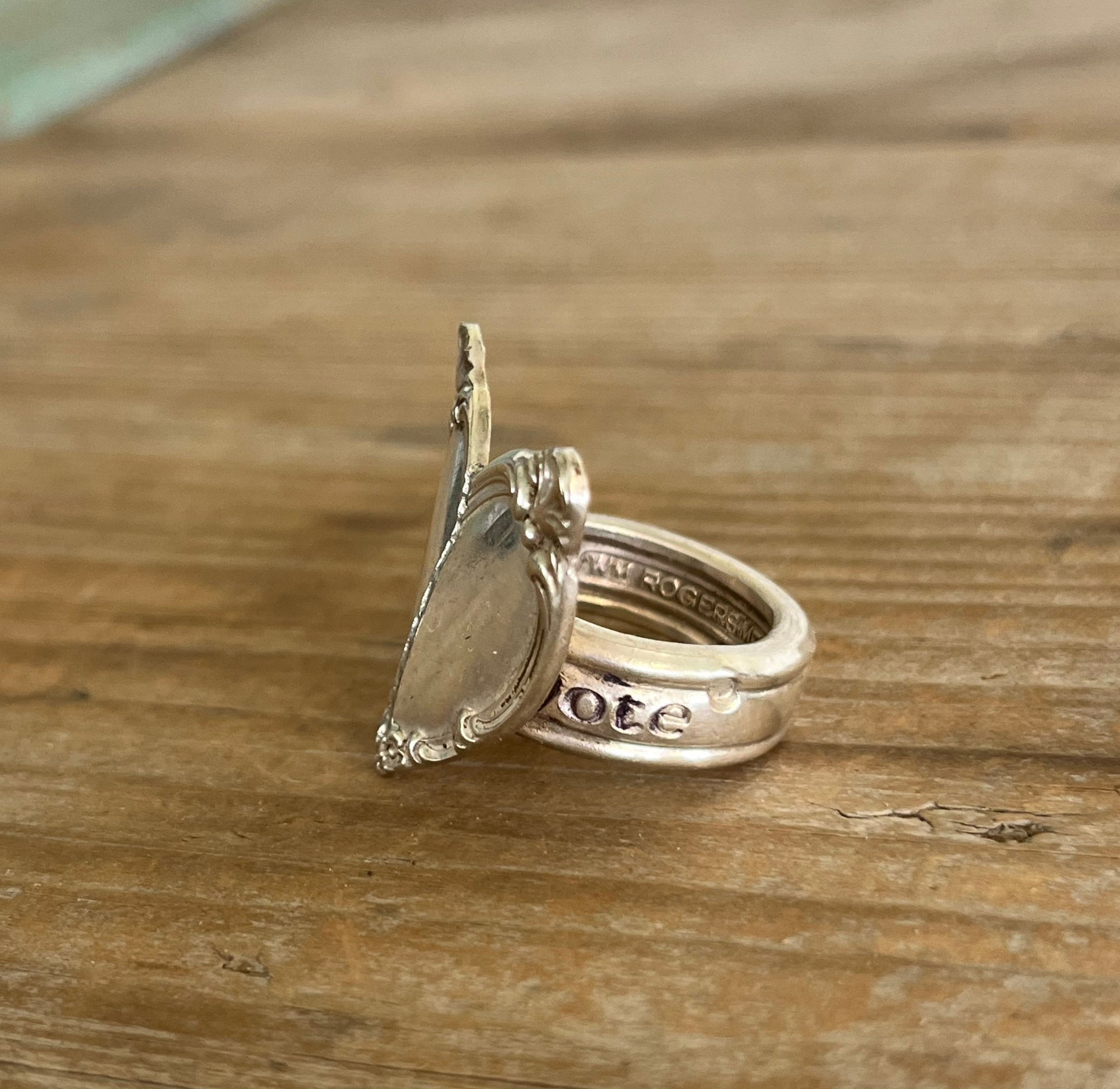 Heart spoon ring showing scrap-bin shank and International Silver Victorian Rose pattern from 1954