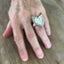 Victorian Rose heart ring shown on hand - handcrafted upcycled silverware jewelry