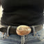 Front view of PEACE spoon belt buckle showing vintage silverplate casserole spoon with applied peace symbol detail, handmade accessory, 4 x 3 inches
