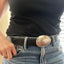Handmade spoon belt buckle with hand-stamped peace symbol shown on model fits 1.5-inch belt