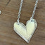 Detail view of MEADOWBROOK fork handle heart pendant - Fork Handle Heart Necklace - handcrafted from upcycled vintage silverware - Laughing Frog Studio