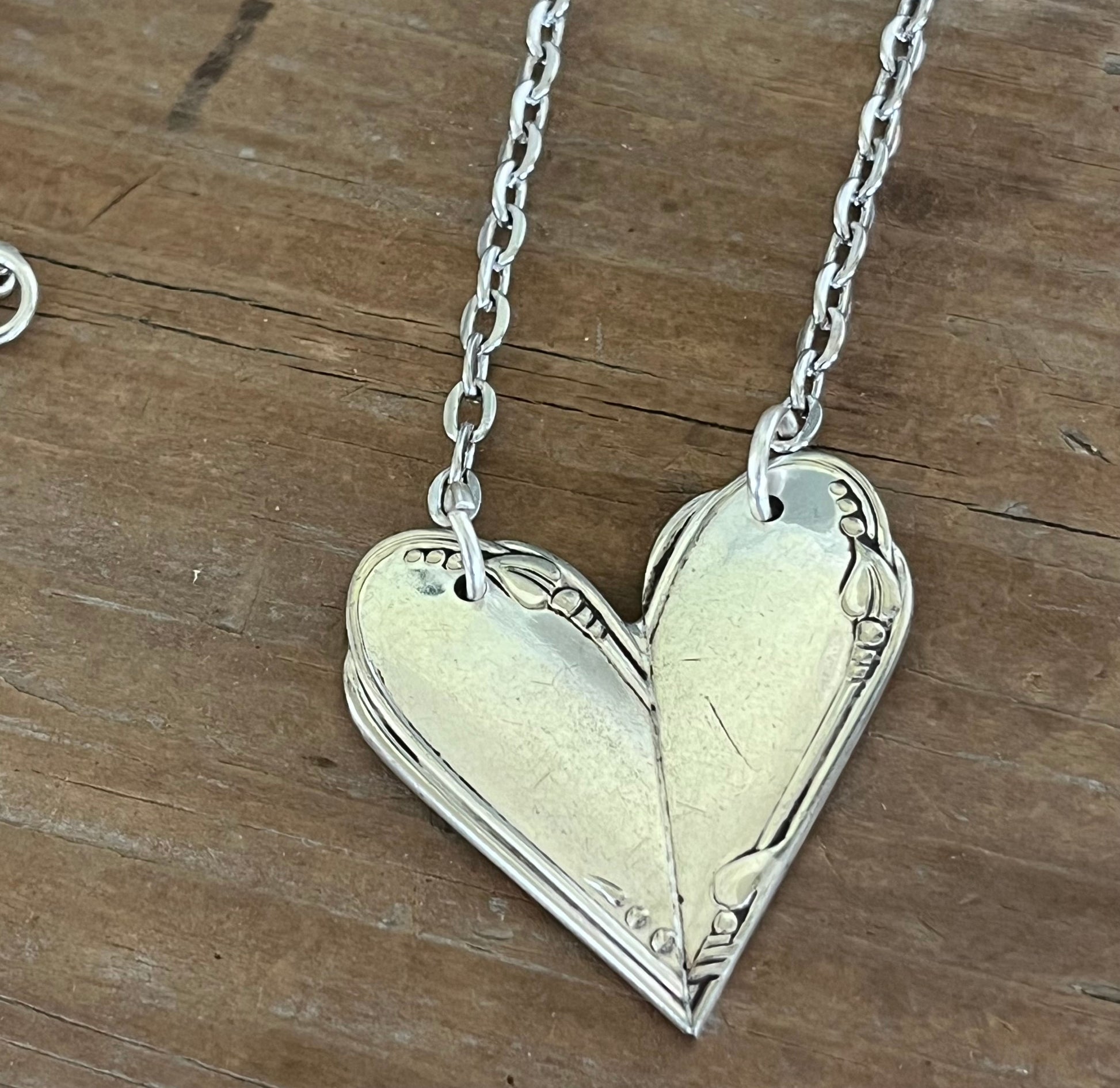 Detail view of MEADOWBROOK fork handle heart pendant - Fork Handle Heart Necklace - handcrafted from upcycled vintage silverware - Laughing Frog Studio