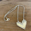 Close up of MEADOWBROOK pattern fork handle heart necklace - Fork Handle Heart Necklace - handcrafted from upcycled vintage silverware - Laughing Frog Studio