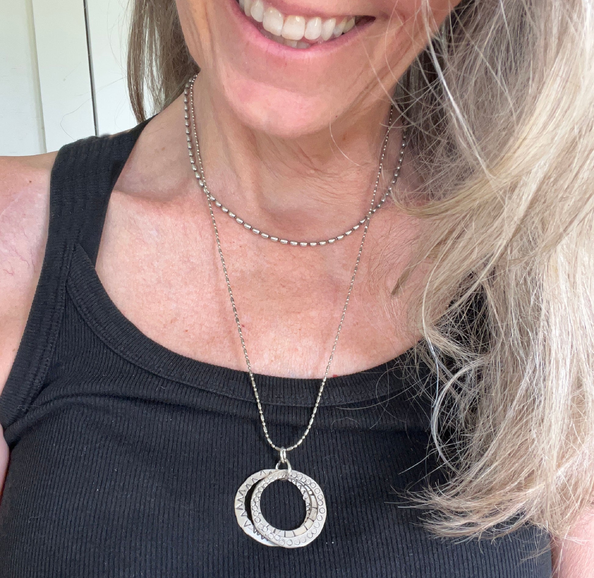 Movement rings spoon necklace worn on model - artisan silverware statement necklace - handcrafted from upcycled vintage silverware - Laughing Frog Studio