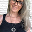 Hand-stamped kinetic movement rings artisan spoon necklace on model - artisan silverware statement necklace - handcrafted from upcycled vintage silverware - Laughing Frog Studio
