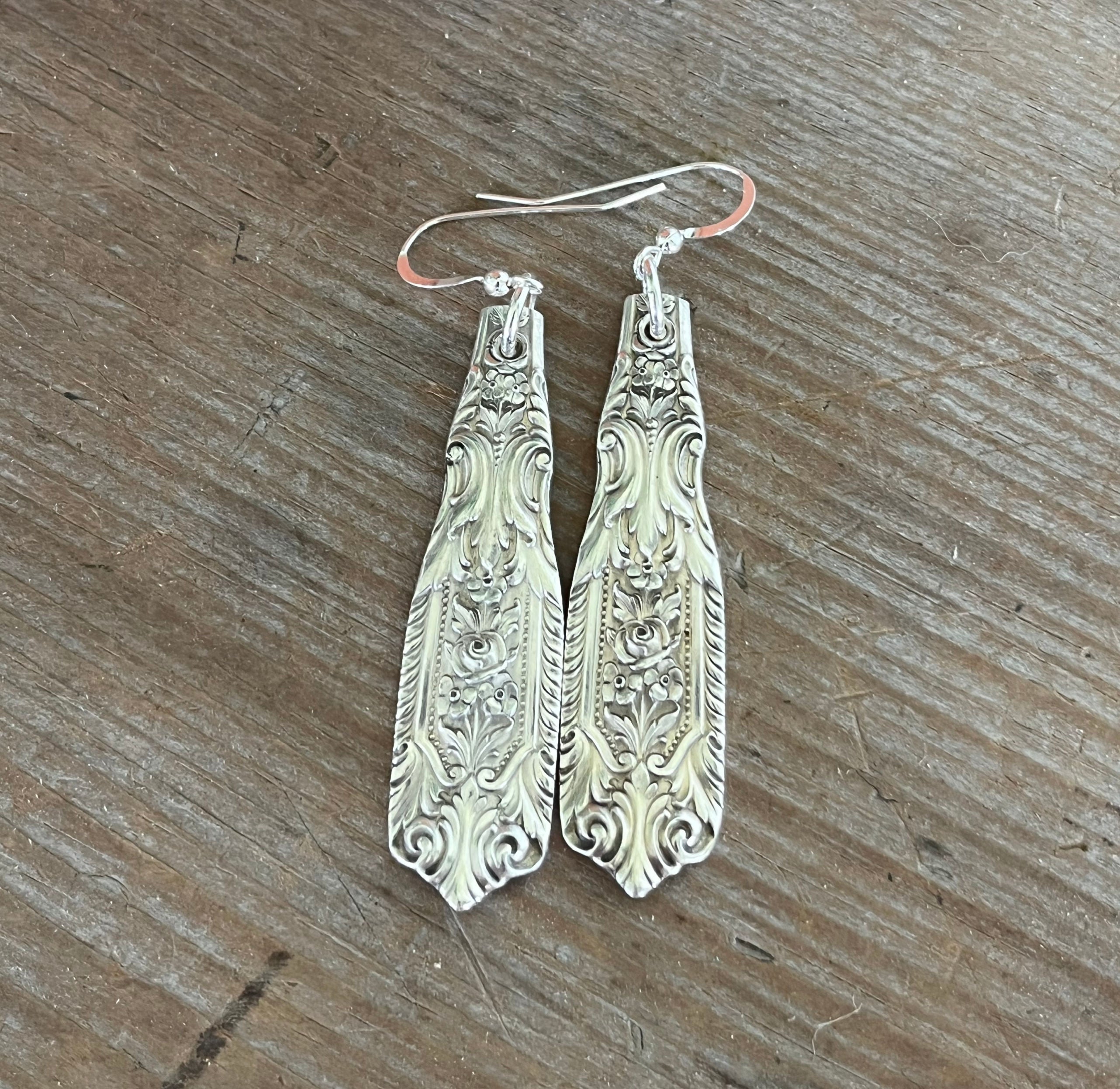 Antique MILBURN ROSE pattern sterling silver spoon earrings flat lay on weathered wood - Sterling Spoon Earrings - handcrafted from upcycled vintage silverware - Laughing Frog Studio