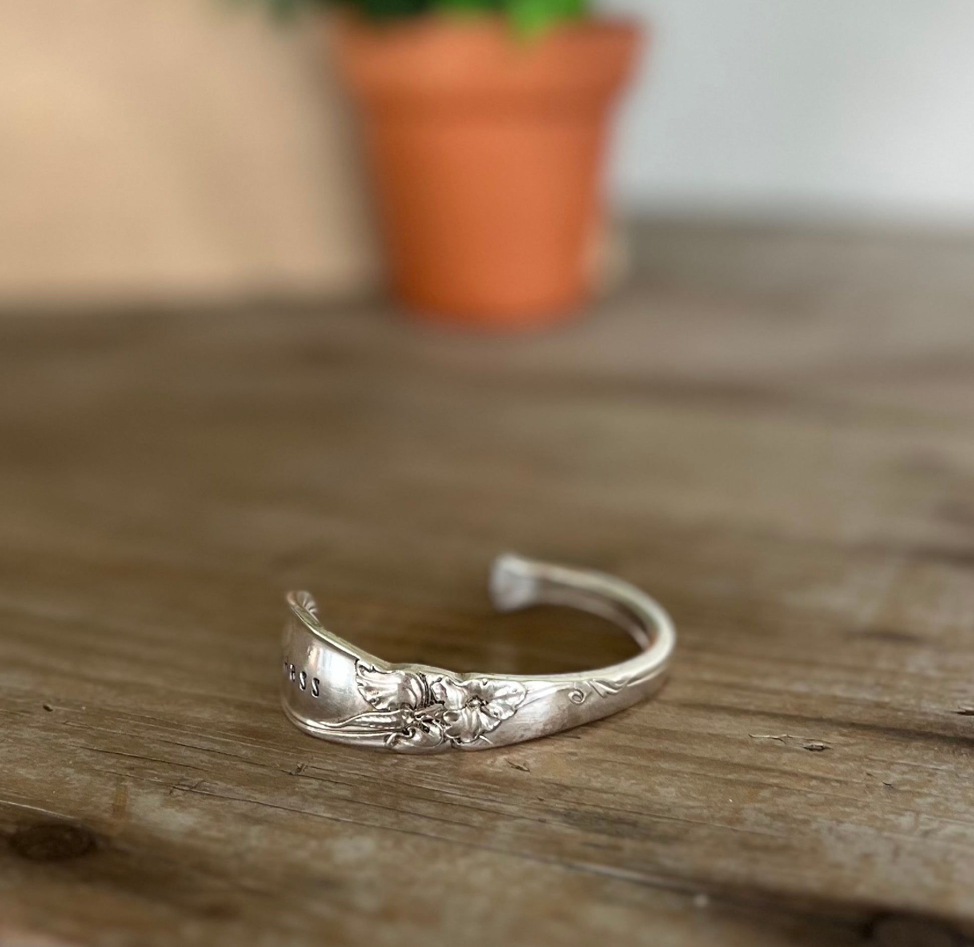 White orchid spoon cuff bracelet   with BADASS message handstamped  and a floral design"