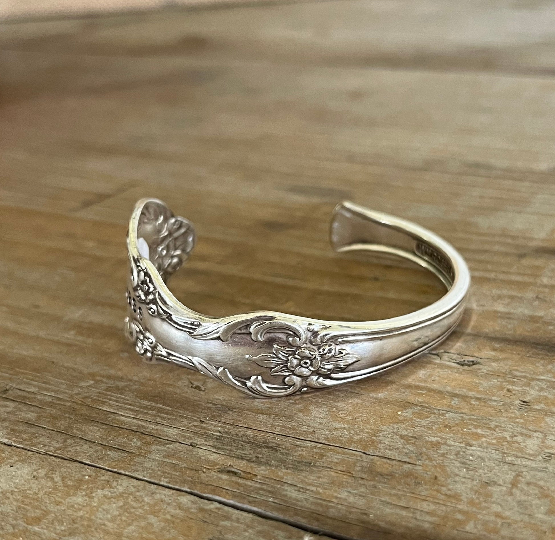 Detailed view of BADASS hand-stamped spoon cuff bracelet - 1959 William Rogers Grand Elegance - upcycled vintage silverware - Laughing Frog Studio