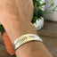 FUCKITY FUCK FUCK hand-stamped spoon cuff bracelet shown on model wrist - vintage 1958 Wm. A. Rogers silverplate with bold message 