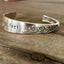 Hand-stamped spoon cuff bracelet from Wm. A. Rogers Always/Wildwood pattern with FUCKITY FUCK FUCK message
