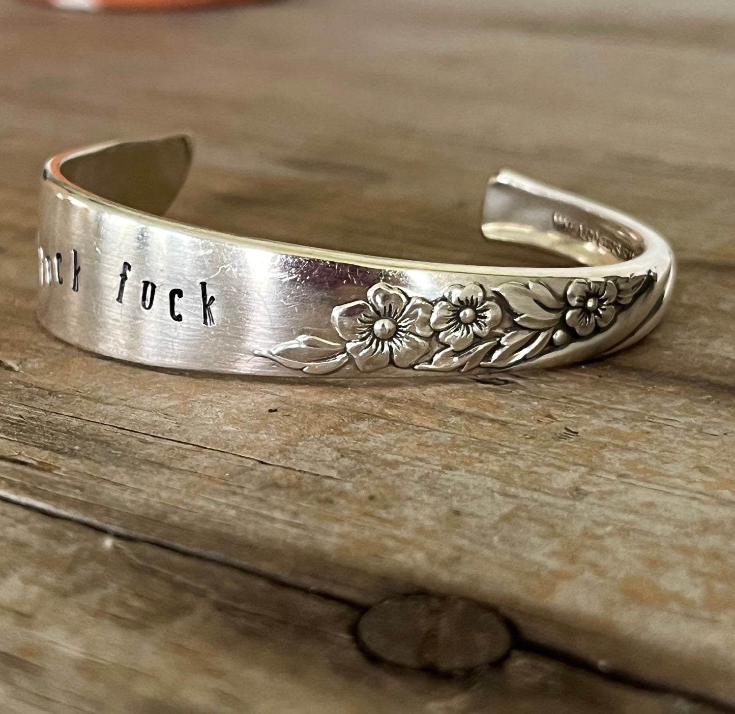 Hand-stamped spoon cuff bracelet from Wm. A. Rogers Always/Wildwood pattern with FUCKITY FUCK FUCK message