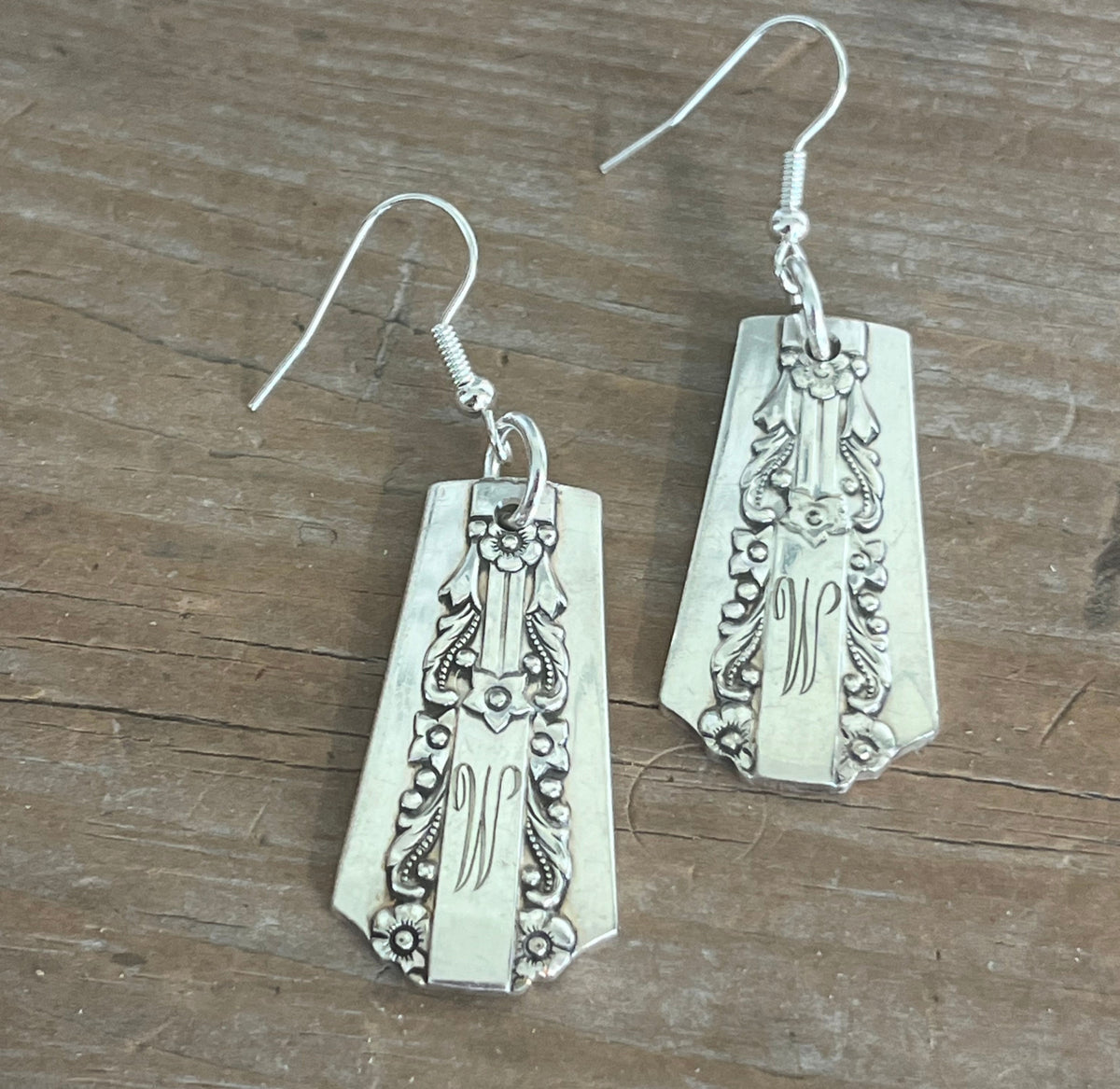 Close up of LIDO pattern spoon handle drop earrings with Monogram - spoon earrings - handcrafted from upcycled vintage silverware - Laughing Frog Studio
