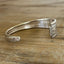Inside view of BADASS hand-stamped spoon cuff bracelet - handcrafted from upcycled vintage silverware - Laughing Frog Studio