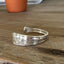 Hand-stamped FUCKITY FUCK FUCK message on vintage Tudor Plate Queen Bess II silverplate spoon - spoon cuff bracelet - handcrafted from upcycled vintage silverware - Laughing Frog Studio