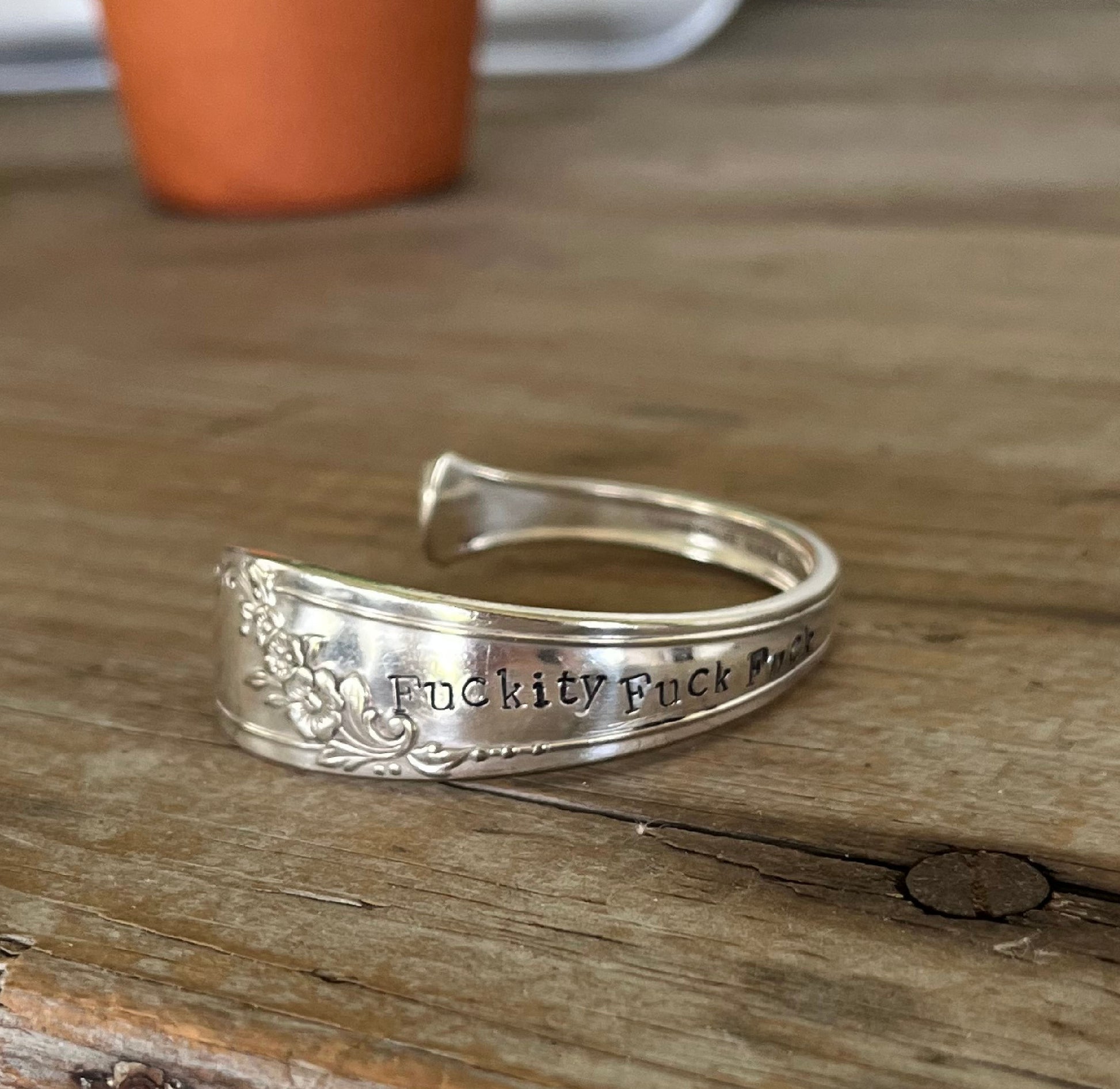 Hand-stamped FUCKITY FUCK FUCK message on vintage Tudor Plate Queen Bess II silverplate spoon - spoon cuff bracelet - handcrafted from upcycled vintage silverware - Laughing Frog Studio