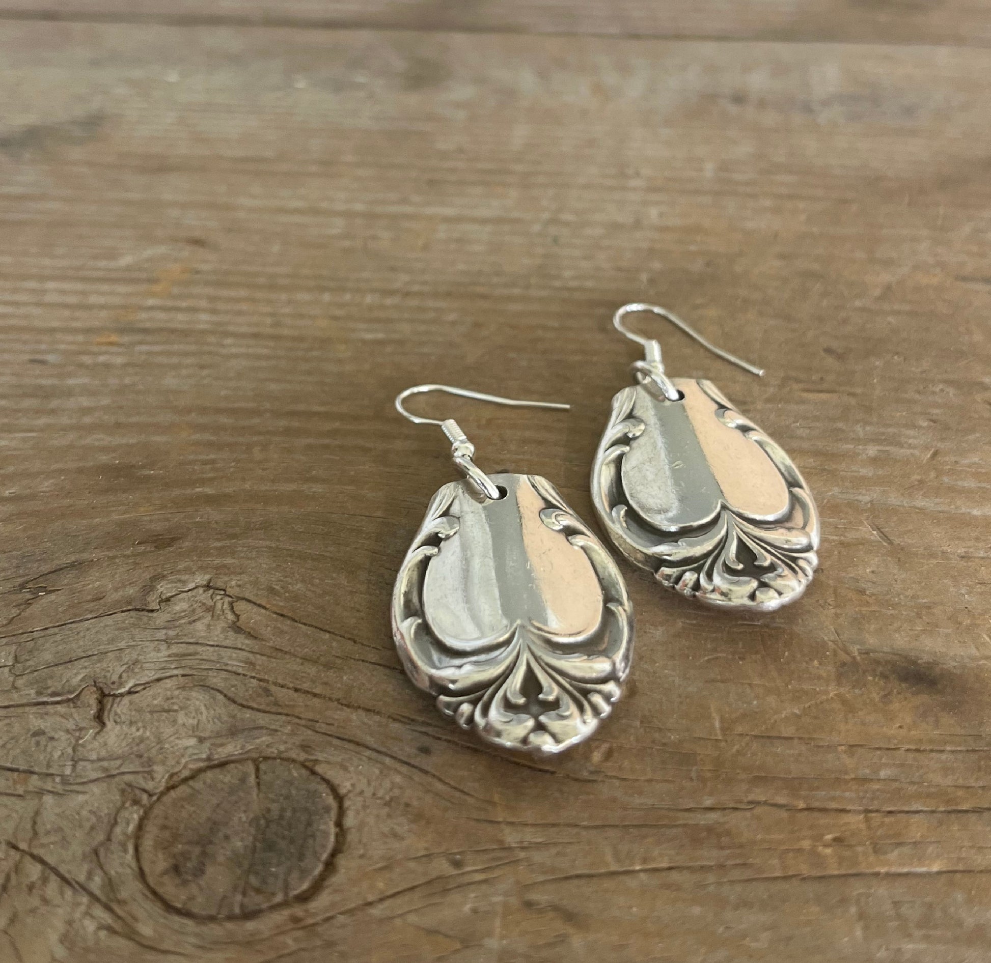 Detail view of Silver Fashion pattern spoon handle drop earrings - spoon earrings - handcrafted from upcycled vintage silverware - Laughing Frog Studio