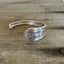 Shot of hand-stamping of FUCKITY FUCK FUCK on spoon cuff bracelet - 1936 William A. Rogers - upcycled vintage silverware - Laughing Frog Studio