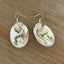 Handcrafted baby spoon earrings with bird of peace charms and faux pearl beads, upcycled vintage silverware