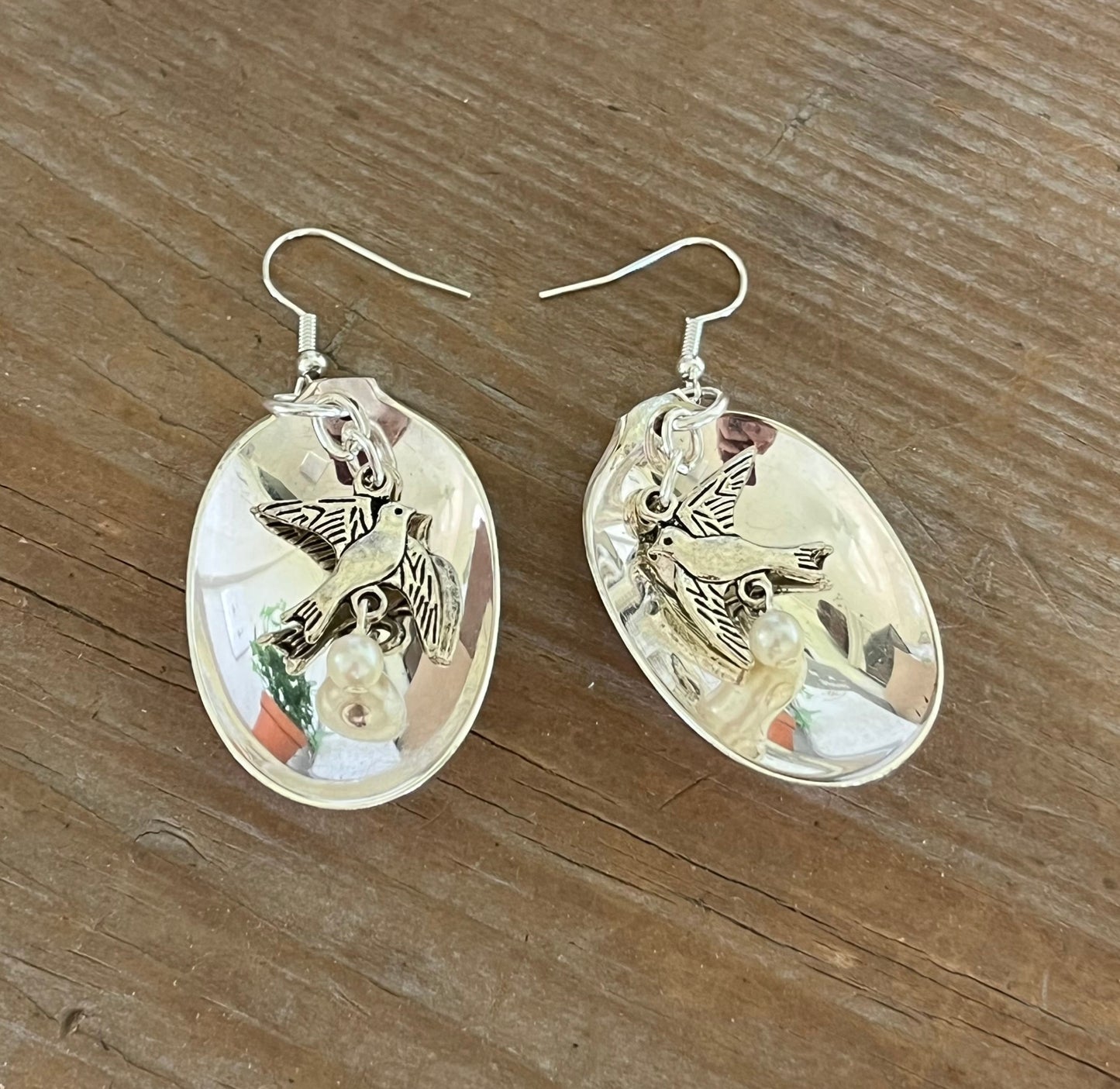 Handcrafted baby spoon earrings with bird of peace charms and faux pearl beads, upcycled vintage silverware