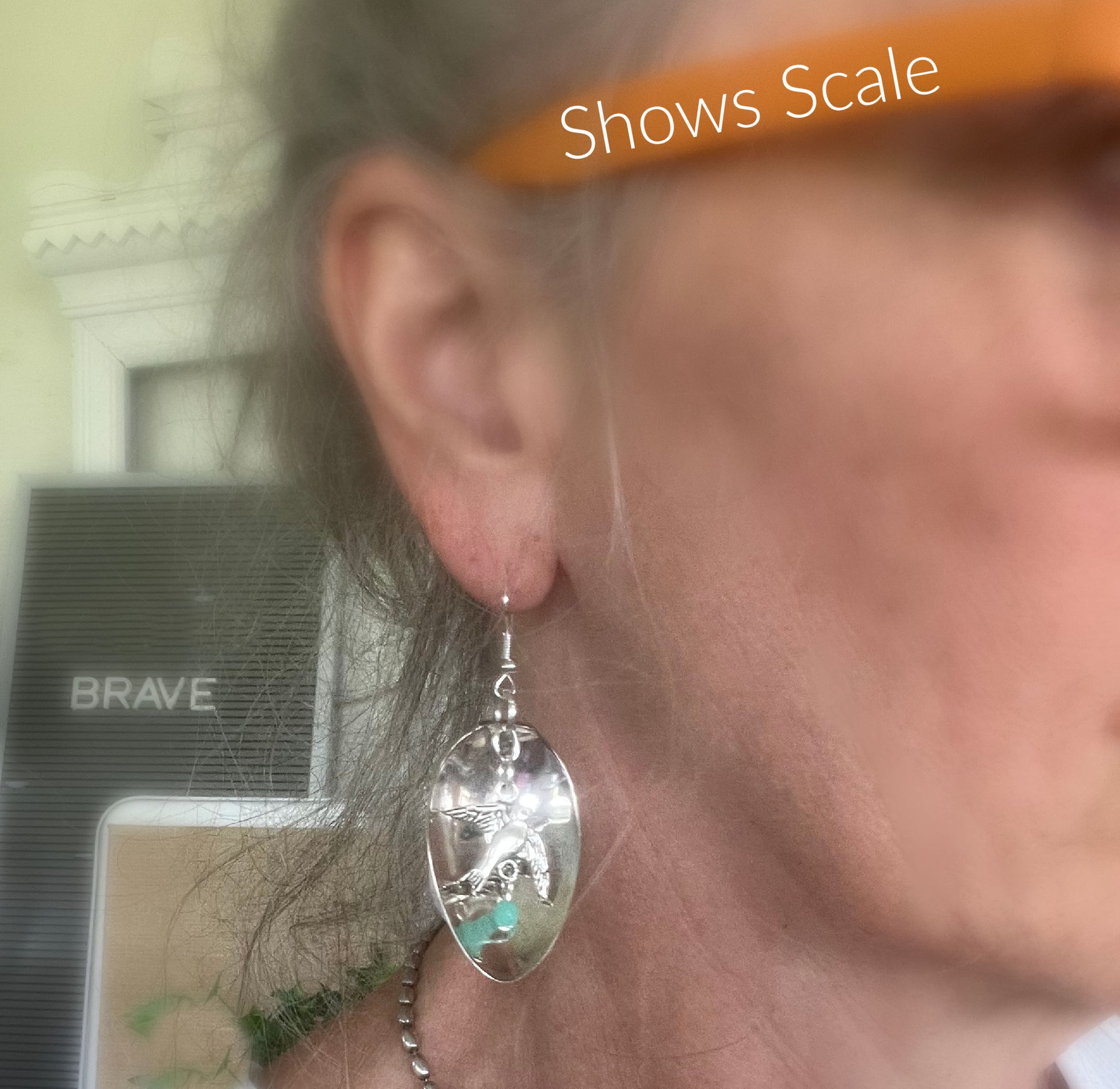 Demitasse spoon earrings with bird of peace charms and jadeite bead shown on ear for scale and fit - Spoon Earrings - handcrafted from upcycled vintage silverware - Laughing Frog Studio
