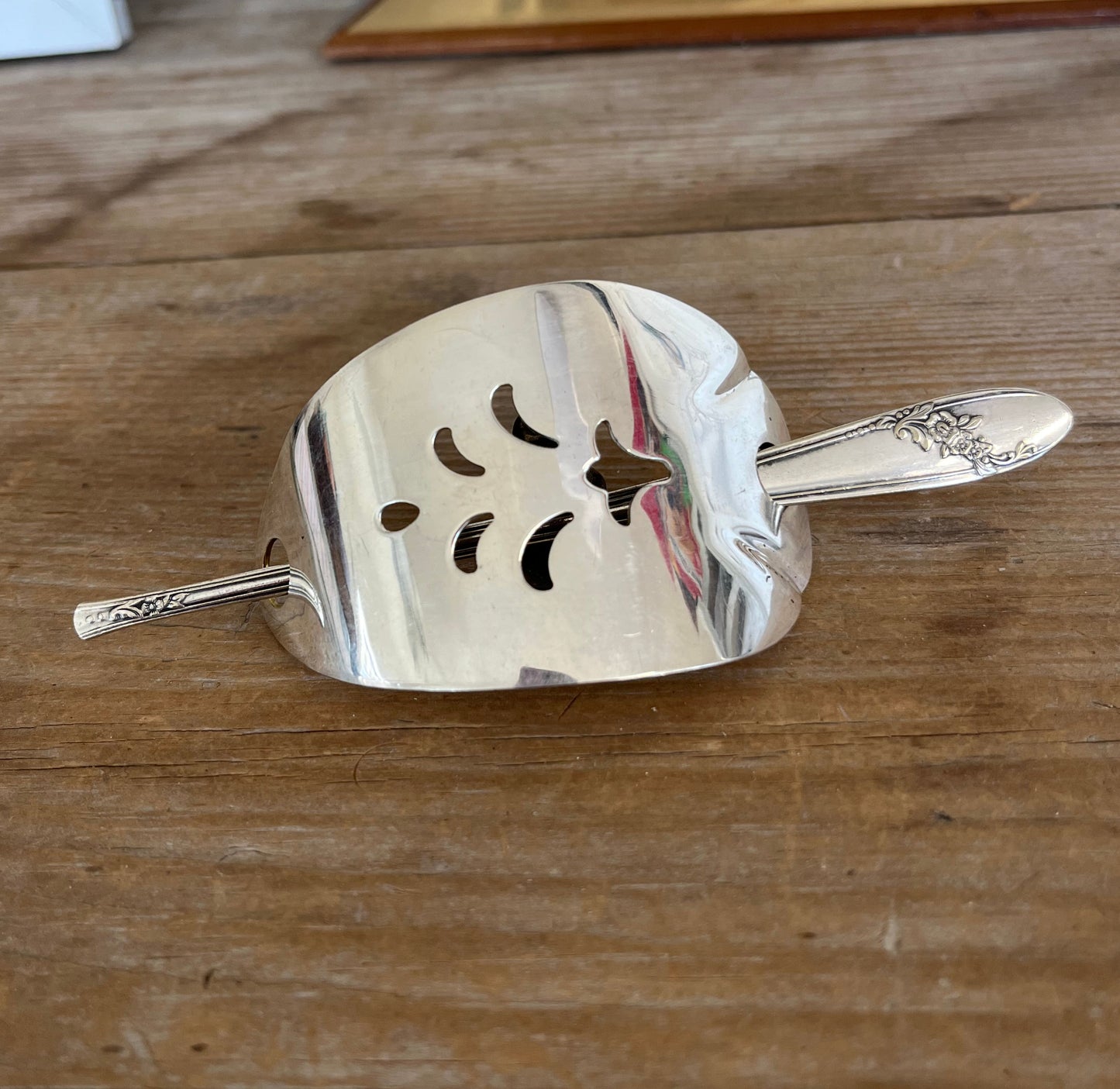 One-of-a-kind cake server hair barrette upcycled from vintage Oneida silverware