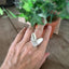 FIRST LOVE pattern sculpted heart statement ring on a model's hand - Statement Ring - handcrafted from upcycled vintage silverware - Laughing Frog Studio