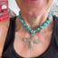 Full view of Jubliee by International Silver spoon cross pendant on chunky turquoise howlite bead choker necklace worn on model - handcrafted from upcycled vintage silverware - Laughing Frog Studio