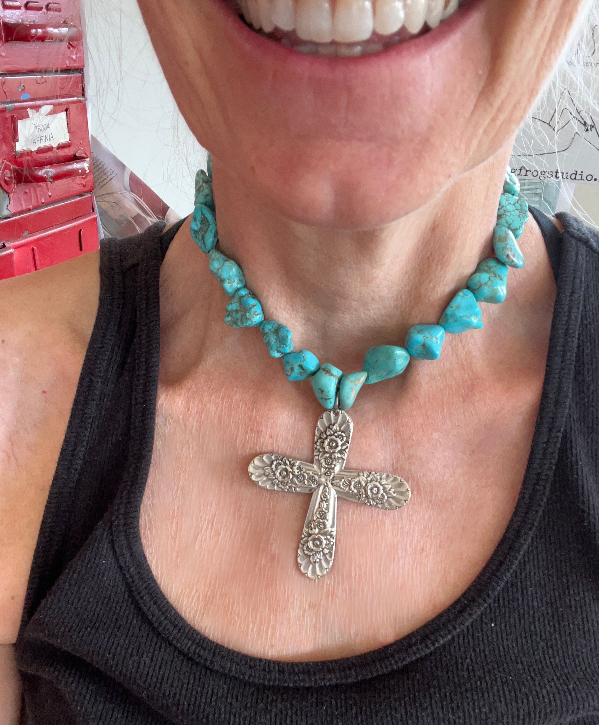 Full view of Jubliee by International Silver spoon cross pendant on chunky turquoise howlite bead choker necklace worn on model - handcrafted from upcycled vintage silverware - Laughing Frog Studio