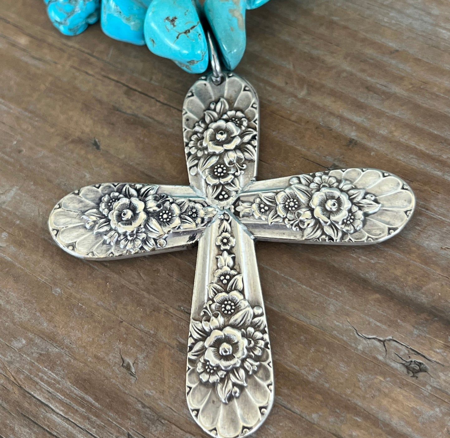 Detail view of Jubliee by International Silver spoon cross pendant on chunky turquoise howlite bead choker necklace - handcrafted from upcycled vintage silverware - Laughing Frog Studio