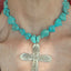 Jubliee by International Silver spoon cross pendant on chunky turquoise howlite bead choker on model - handcrafted from upcycled vintage silverware - Laughing Frog Studio