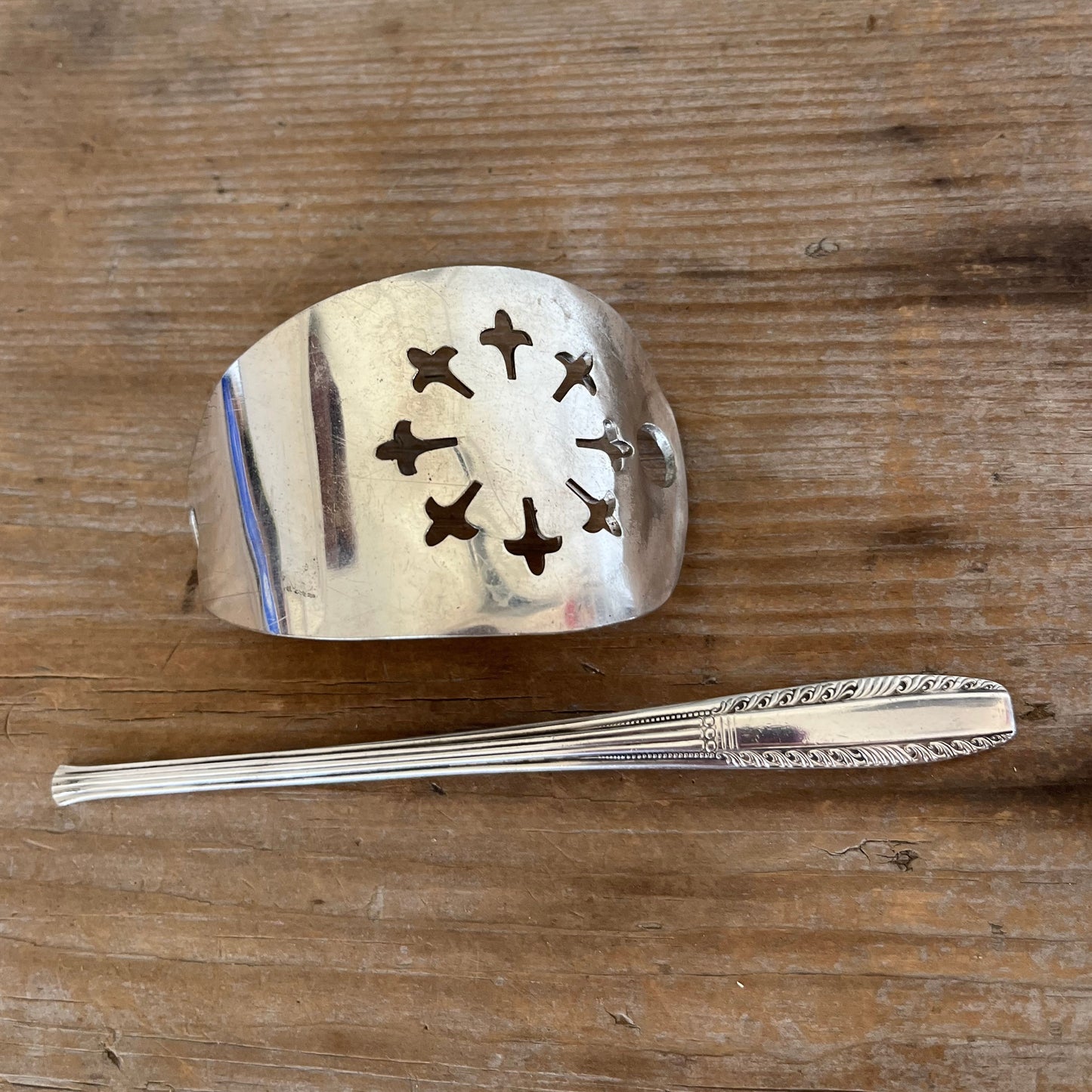 Cake server hair barrette with Wallace Brothers Sharon stick view of both pieces - handcrafted upcycled vintage silverware hair accessory - Laughing Frog Studio