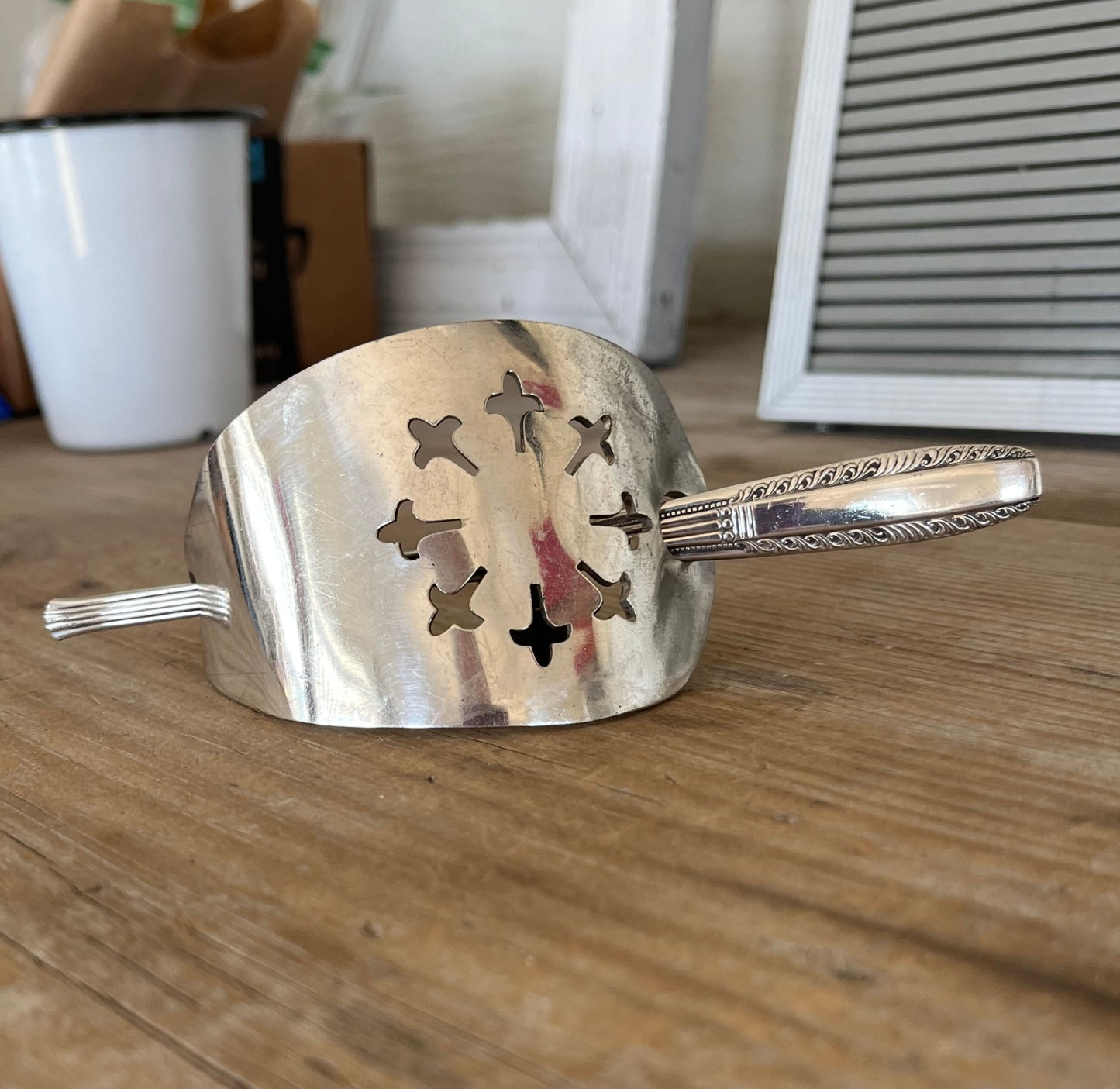 Close up view of cake server hair barrette with Wallace Brothers Sharon stick - handcrafted upcycled vintage silverware hair accessory - Laughing Frog Studio