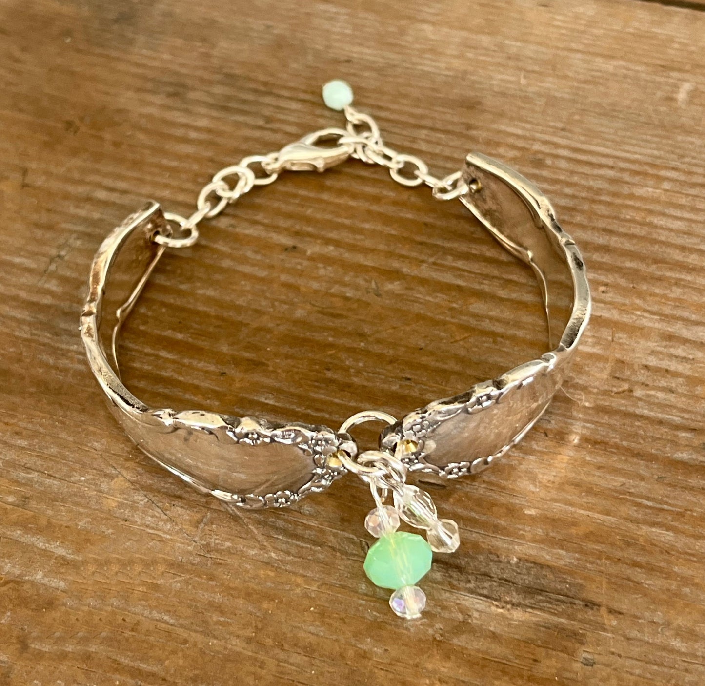 Top view of Oneida Dover pattern spoon link bracelet with glass beads - handcrafted from upcycled vintage silverware - Laughing Frog Studio