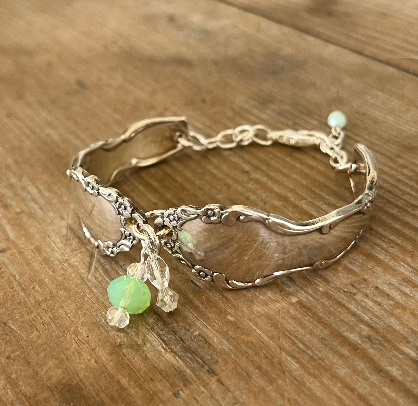 Close-up of Oneida Dover pattern spoon link bracelet with glass beads - handcrafted from upcycled vintage silverware - Laughing Frog Studio