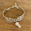 Close up of Holmes & Edwards Imperial pattern spoon link bracelet with glass beads - handcrafted from upcycled vintage silverware - Laughing Frog Studio