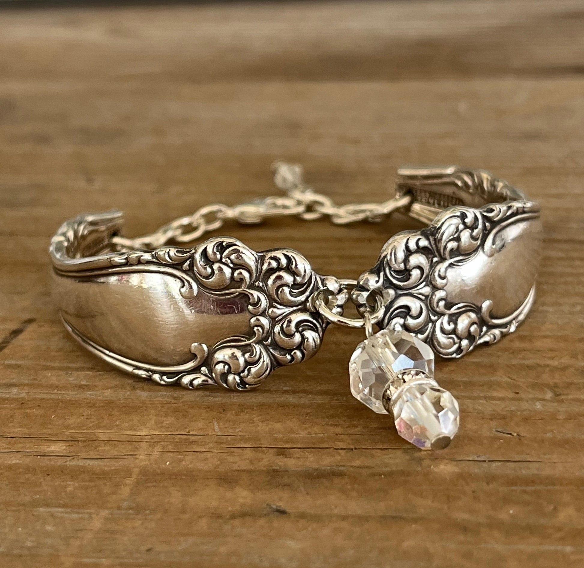 Detail view of Holmes & Edwards Imperial pattern spoon link bracelet with glass beads - handcrafted from upcycled vintage silverware - Laughing Frog Studio