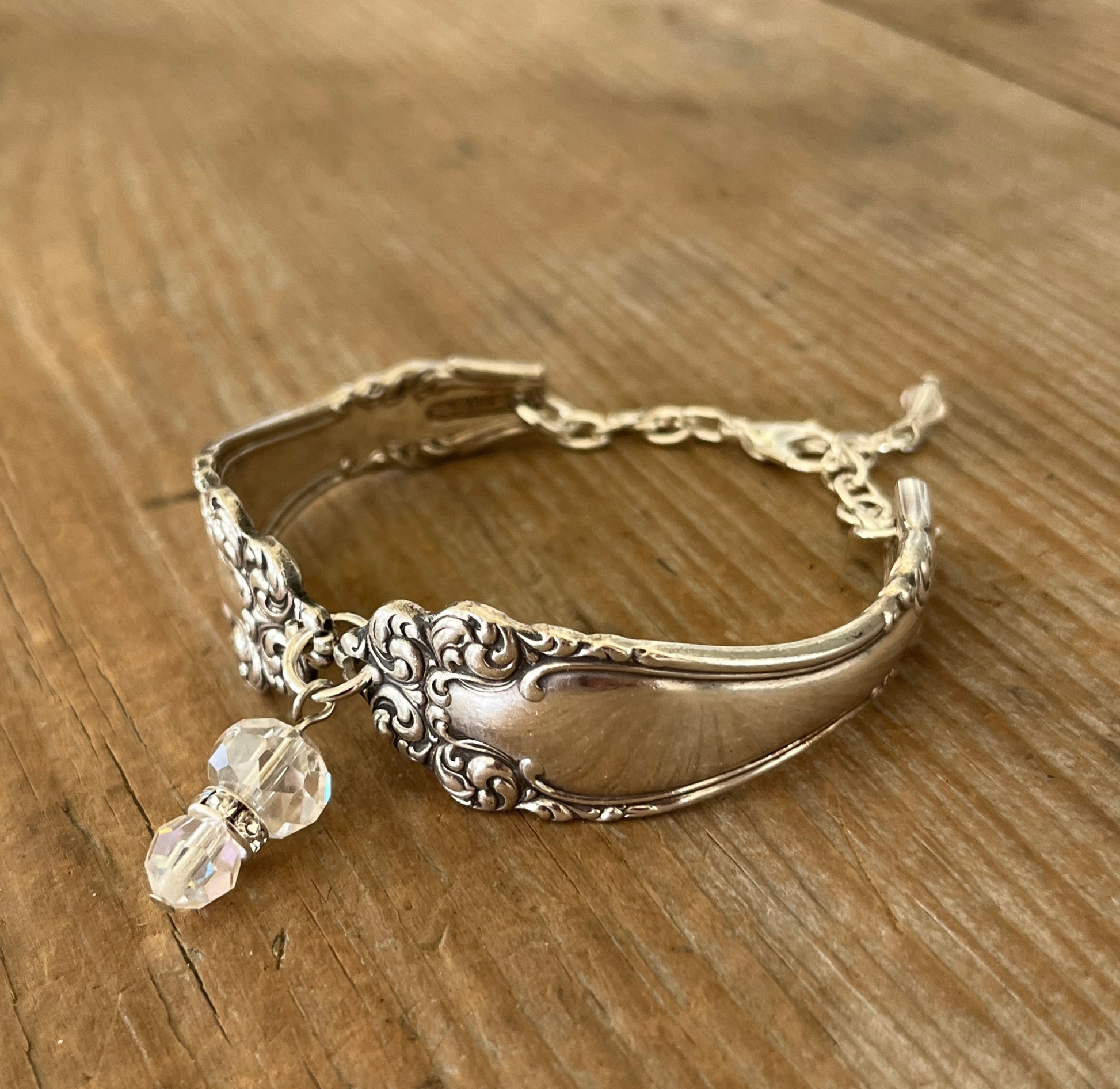 Side view of Holmes & Edwards Imperial pattern spoon link bracelet with glass beads - handcrafted from upcycled vintage silverware - Laughing Frog Studio