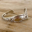Close-up detail of Stratford Silverplate Lilyta pattern spoon cuff bracelet - upcycled vintage silverware - Laughing Frog Studio
