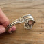 Detail view of Arbutus pattern spoon cuff bracelet - William Rogers & Son - upcycled vintage silverware - Laughing Frog Studio