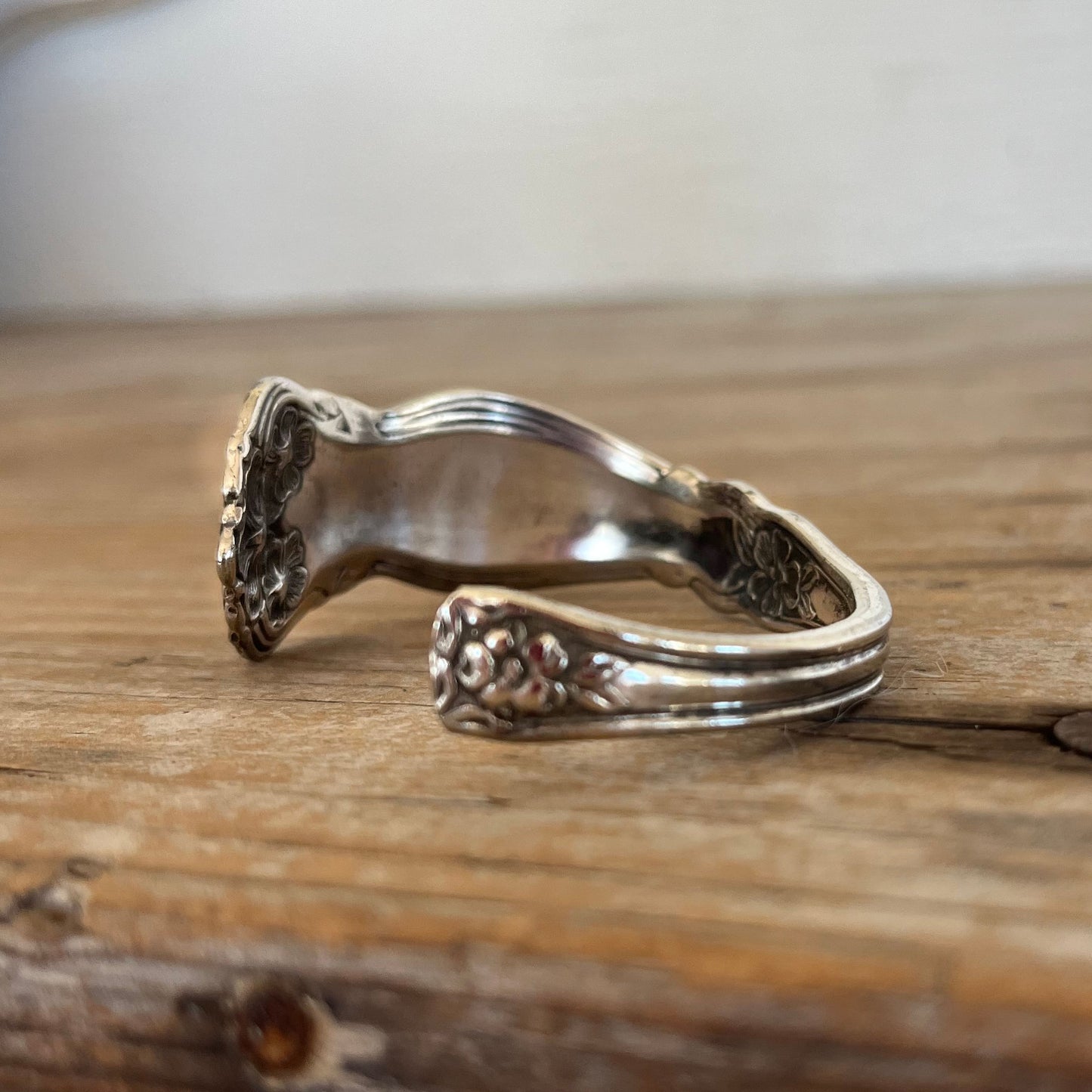 Close-up detail of Arbutus pattern spoon cuff bracelet - William Rogers & Son - upcycled vintage silverware - Laughing Frog Studio
