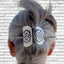 Handcrafted danish cake server barrette adorning bun hairstyle displaying Quess Bess silverware stick - upcycled vintage silverware - Laughing Frog Studio