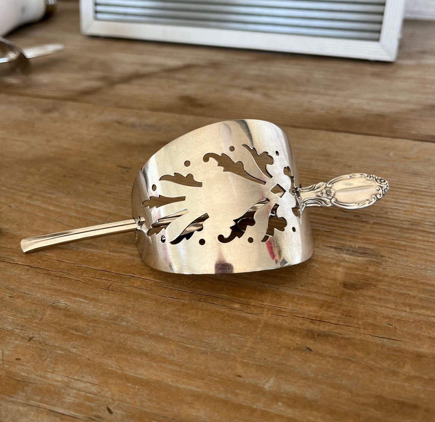 Handcrafted cake server barrette made from vintage silverplate with Enchantment spoon stick