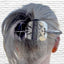 Handcrafted cake server hair barrette accessorizing bun hairstyle displaying punched silverware texture in hair