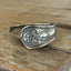 Detail view of Edwardian spoon cuff bracelet handcrafted from 1910 William Rogers silverplate - upcycled vintage silverware bracelet - Laughing Frog Studio

Image 2