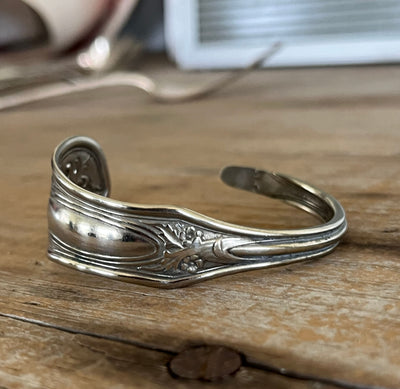 Upcycled spoon cuff bracelet with Edwardian floral border detail - handcrafted from upcycled vintage silverware - Laughing Frog Studio